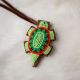 Leather Turtle Amulet with Light & Dark Green and Red Beads